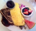 breakfast house omelette with articoke mushroom and swiss